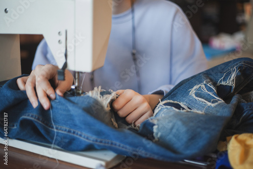 A young seamstress sews a wardrobe and develops her small business