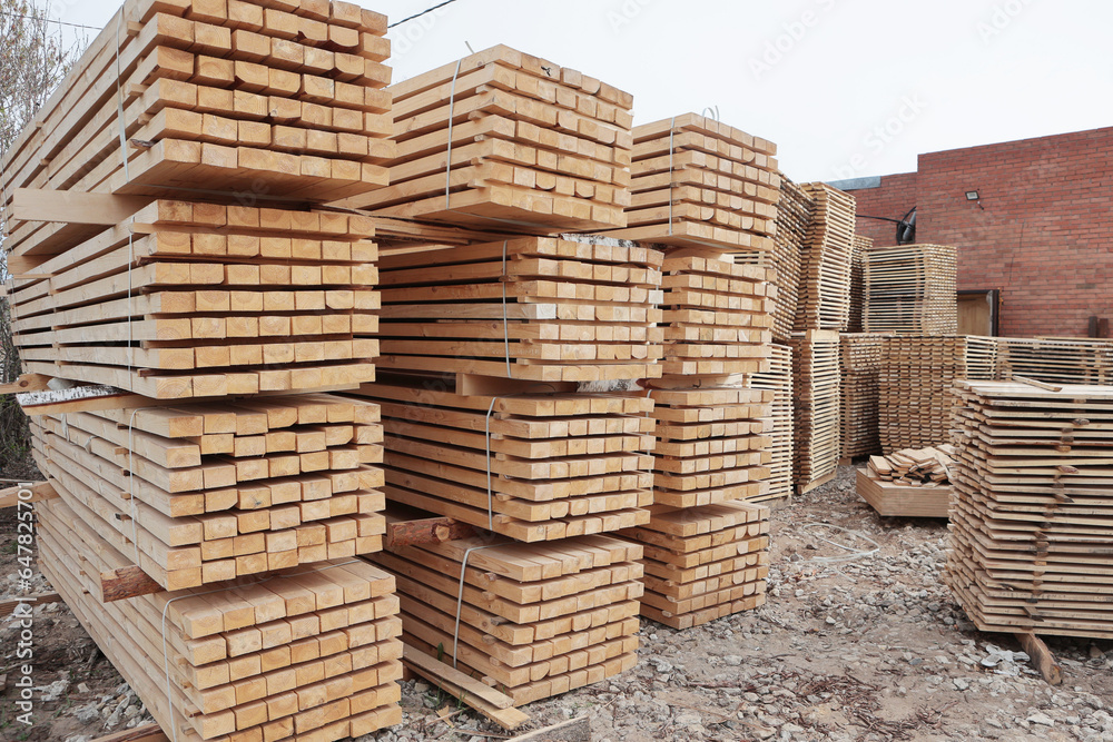 Pallets for building materials.Wooden stands for transportation of building materials. Wooden pallets are stacked. Pallets for building materials.Wooden stands for transportation of building materials. Wooden pallets are stacked.
