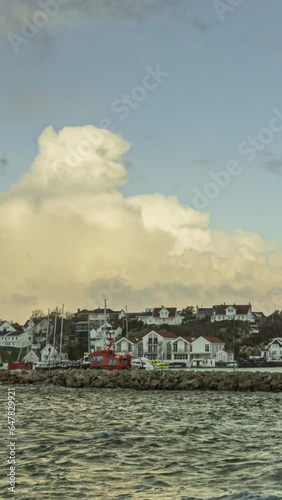 vertical timelapse of boat harbor in tananger photo