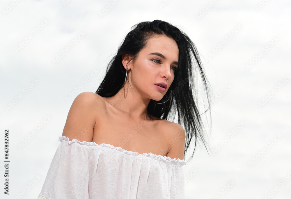 Beautiful hispanic girl. Portrait of beautiful model with natural nude make up. Beautiful woman face close up studio on white.