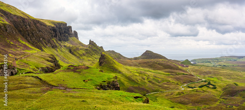 Panoramic view of the spectacular and strange landscape of the Quiraing Mountains on the Isle of Skye, Scotland. © josemiguelsangar