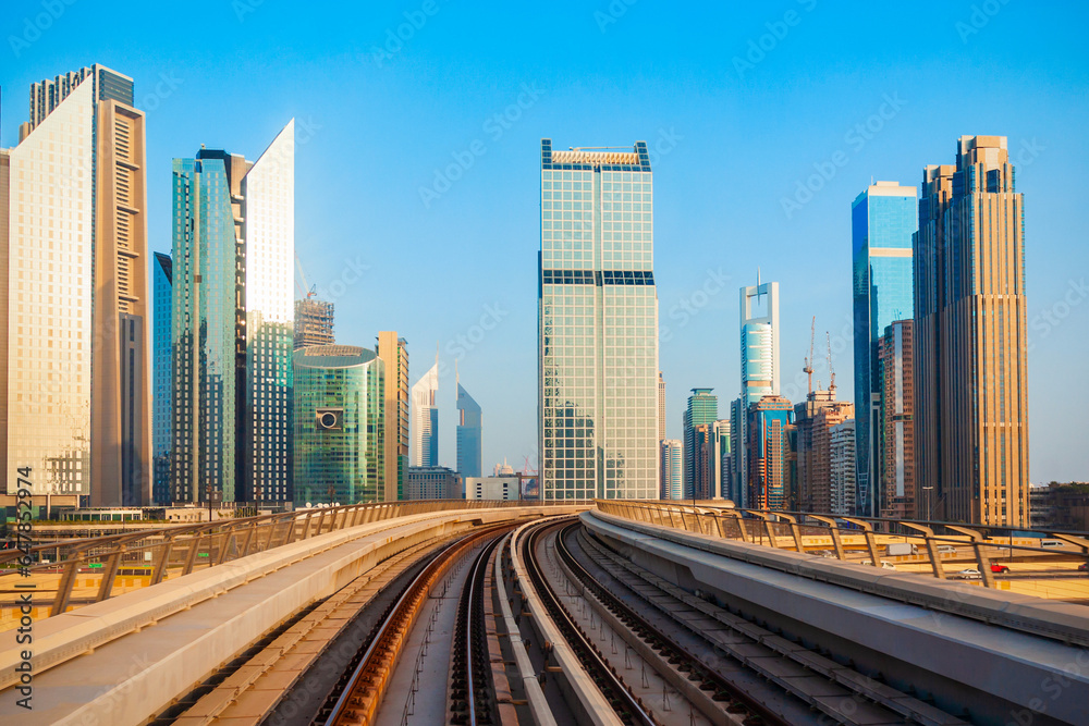 Dubai Metro and city skyline, UAE