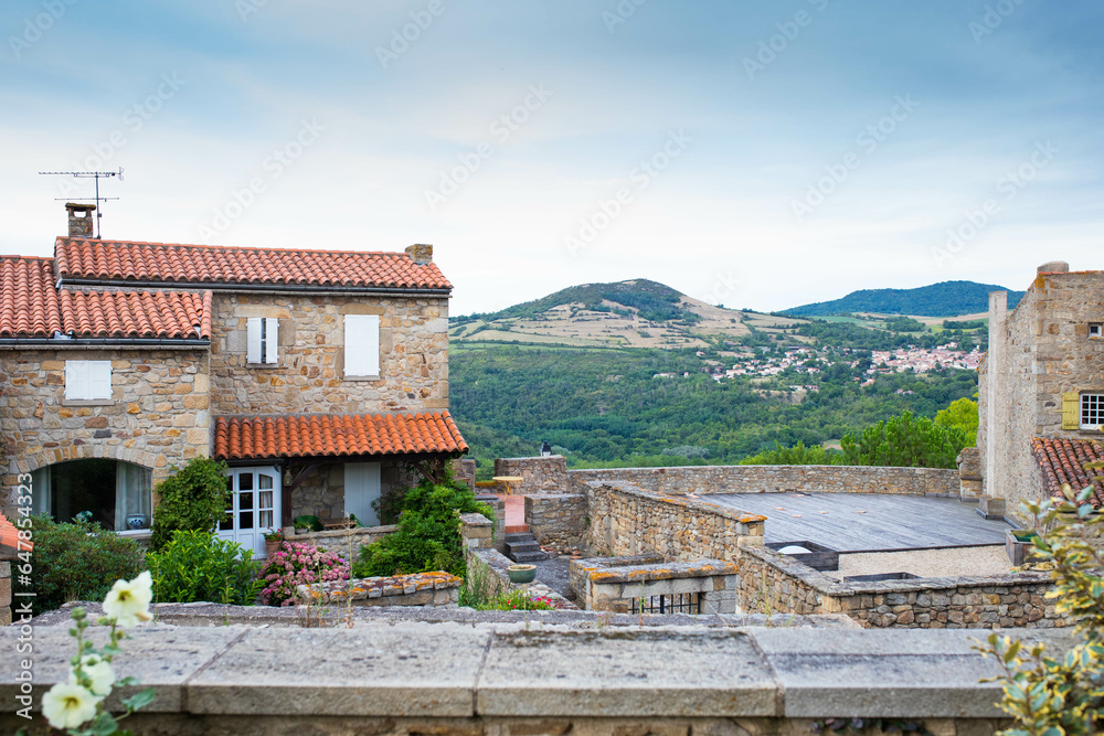 Terrace view in the charming medieval village of Montpeyroux, Auvergne, France. Terrace view in the charming medieval village of Montpeyroux, Auvergne, France.