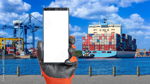 Sea port. Phone in hand. Sm...