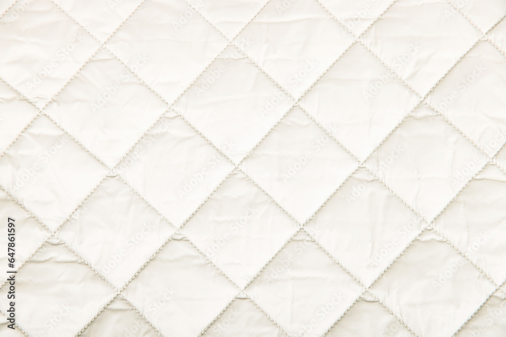 Quilted fabric background. texture blanket or puffer jacket - obrazy, fototapety, plakaty 