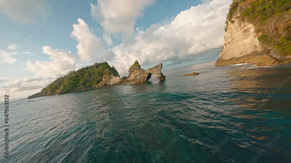 FPV Drone at rocky shore at Penida island near Bali. Indonesias hidden gem. Fast Manual close proximity drone flight 