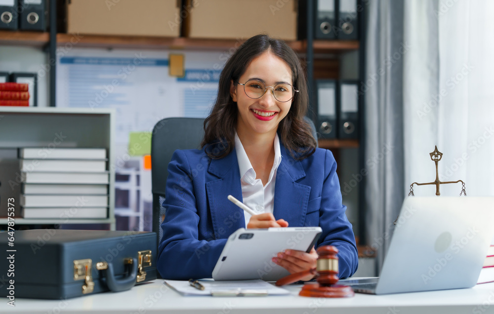 Pretty asian indian business woman as legal services across the board, legal consultant assisting clients with wide array of legal services and offerings, including appraisal and development support. Pretty asian indian business woman as legal services across the board, legal consultant assisting clients with wide array of legal services and offerings, including appraisal and development support.
