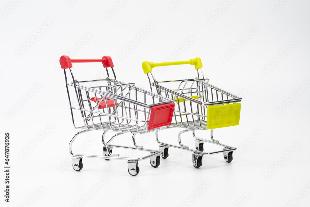 Two empty shopping carts isolated on white background