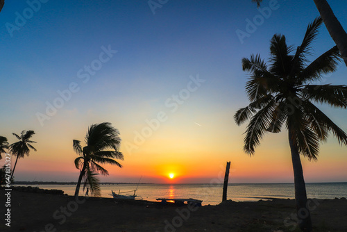 beach with sunset in the afternoon, beach with coconut trees, jawa timur indonesia