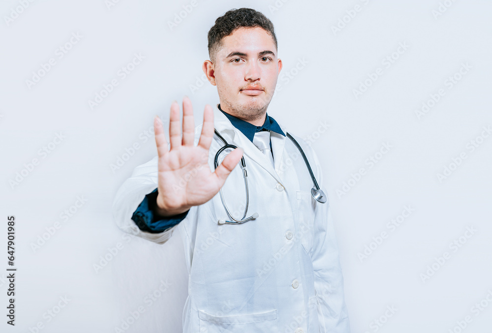 Young doctor counting number 5 on isolated background. Doctor counting number five isolated Young doctor counting number 5 on isolated background. Doctor counting number five isolated