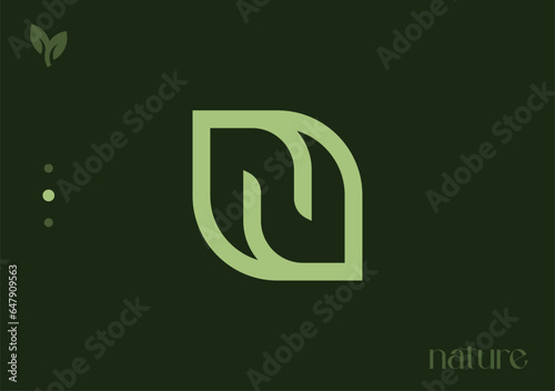 Sleek and fresh, the letter N gracefully incorporates a leaf symbol, epitomizing nature, growth, and a revitalizing connection with simplicity