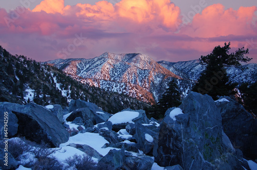 Vibrant Sunset Skies over San Gabriel Mountains via Mt San Antonio summit, A.K.A. Mount Baldy or Old Baldy. Los Angeles and San Bernardino Counties, California, USA.