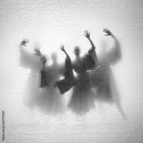 Abstract composition of dancing girls. Theater of shadows through the light with a vintage texture.