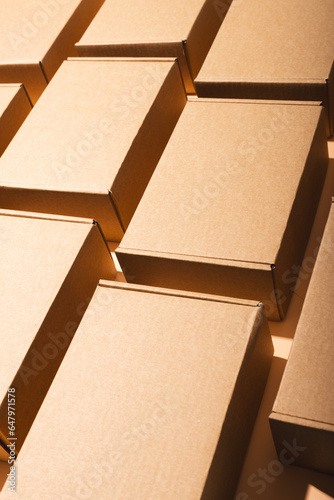 Vertical image of rows of boxes and copy space over cream background
