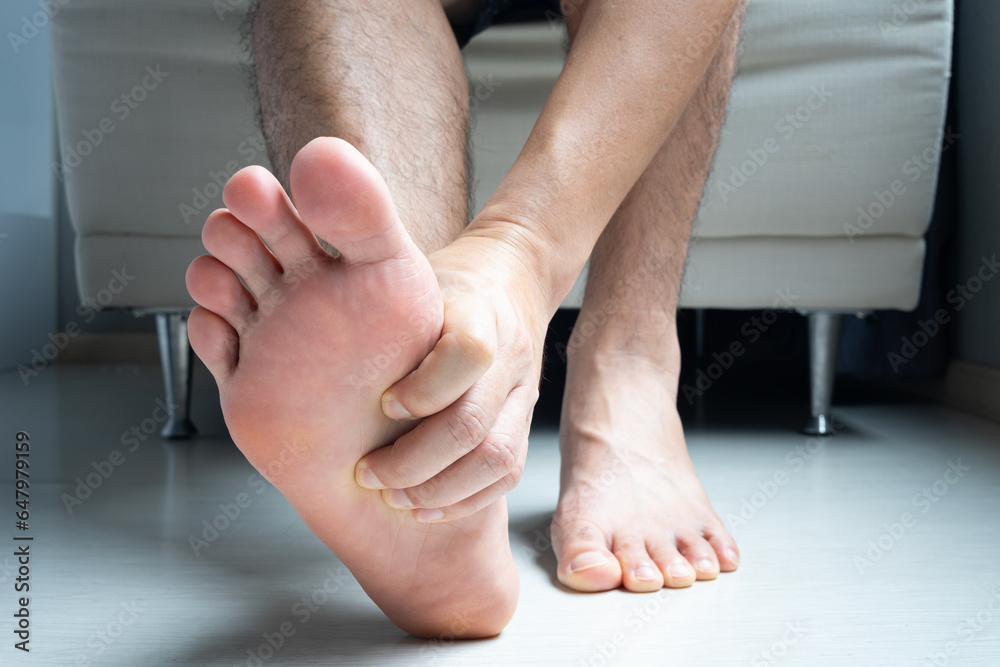Man, foot pain and cramps in legs and ankles from Plantar Fasciitis disease Be relieved the pain