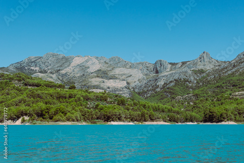 Mountain landscape, picturesque mountain lake on a summer morning, large panorama, Spain, Guadalest © PopOff
