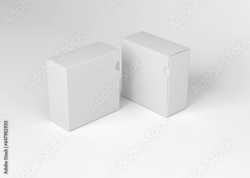 white plain empty blank squarish paper packaging slide boxes on isolated background photo