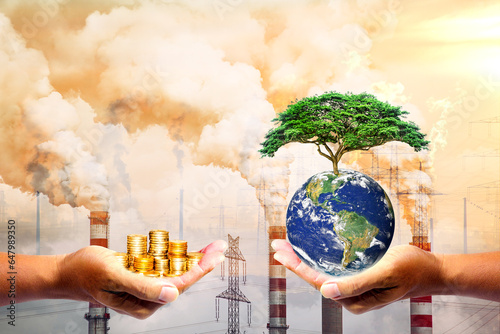 Concept of capitalism and nature conservation, hand holding money and hand holding environment can be used in work related to environmental conservation and saving the world. photo