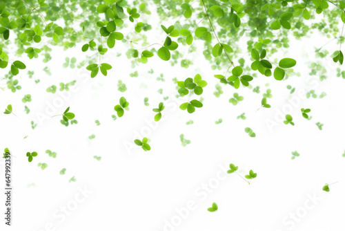 Captivating image capturing bunch of green leaves gracefully flying through air. Perfect for adding touch of nature and movement to any project or design.