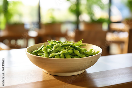 Edamame Bowl On Plate In Botanicalstyle Cafe photo