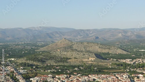 A panoramic view of the city center and the arid countryside, Europe, Greece, Peloponnese, Argolis, Nafplio, Myrto Sea, summer on a sunny day.  photo