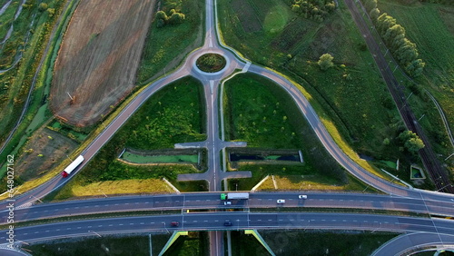 Wallpaper Mural Aerial Of Highway Junction And Trucks At Sunset Torontodigital.ca