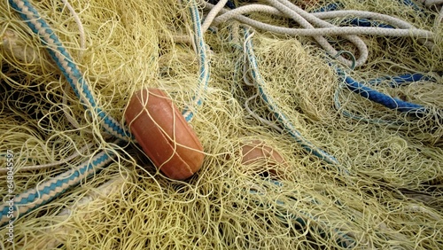 stacked sea fishing net as background © Esteve