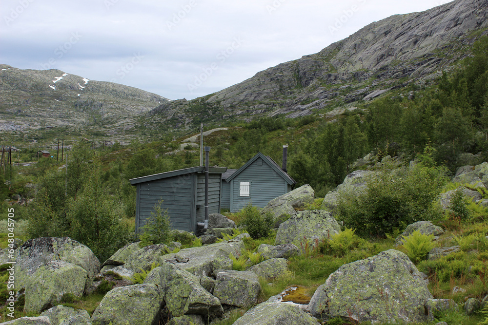 Mountain landscapes of Norway. The top of the mountain range, mountain lake. Hiking to Troltunga Mountain landscapes of Norway. The top of the mountain range, mountain lake. Hiking to Troltunga