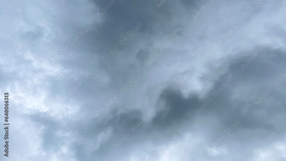 The sky is covered with black rain clouds.