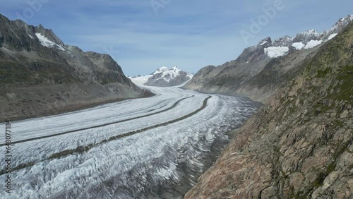 The big Aletsch glacier. UNESCO World Natural Heritage in Switzerland. Largest glacier in the Alps. Aerial Shot photo