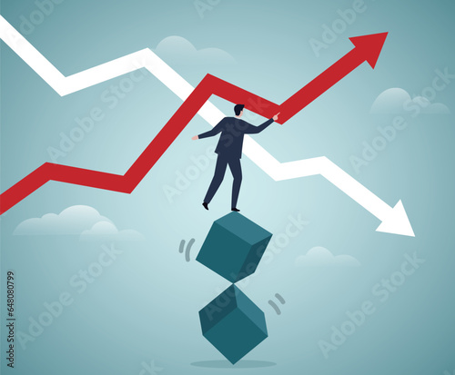 Businessman standing on unbalanced cubes and doing business strategy.