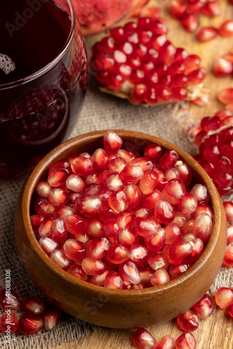 peeled red ripe pomegranate with juicy grains