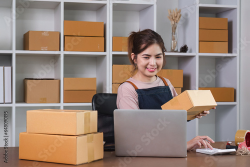 Entrepreneurs, SME businesses, check orders and check the purchase order Prepare parcels for delivery. © wichayada
