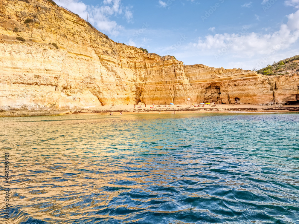 Beach between cliffs in Benagil, Algarve, Portugal