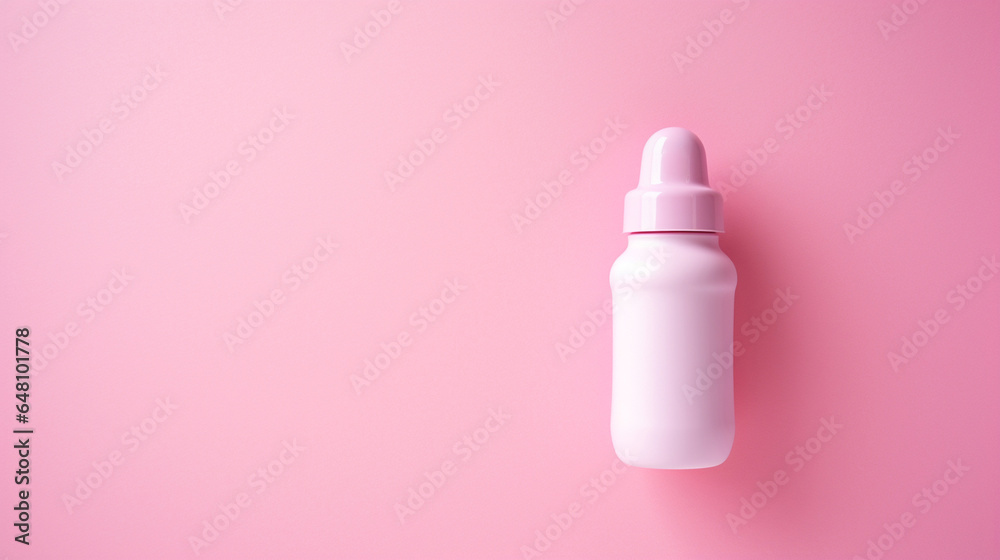 baby feeding bottle for a newborn baby on a pink background baby feeding bottle for a newborn baby on a pink background