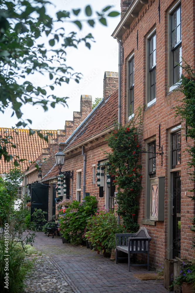 Streets and houses of small historical town Buren in Gelderland, Netherlands in sunny day