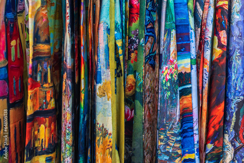 Bright multicolored fabric. Sale of scarves. Venetian, bright colors, abstract drawing. © Irina Satserdova