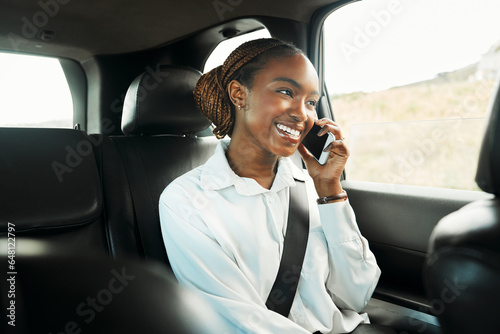 Smile, phone call and a business black woman a taxi for transport or ride share on her commute to work. Mobile, contact and a happy young employee in the backseat of a cab for travel as a passenger photo