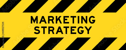 Yellow and black color with line striped label banner with word marketing strategy