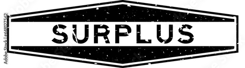 Grunge black surplus word hexagon rubber seal stamp on white background