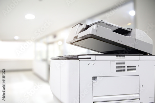 Copier or photocopier or photocopy machine office equipment workplace for scanner or scanning document or printer for printing paperwork hard copy paper duplicate Xerox or service maintenance repair. photo