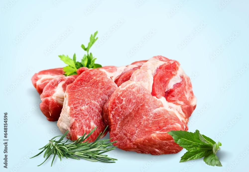 Raw red beef steak with herbs Raw red beef steak with herbs