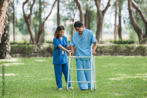 Physical therapy, knee care, elderly care Doctors examine patients, care for the elderly, do physical. Learn to walk in the garden Physical therapist helping elderly patient do physical therapy