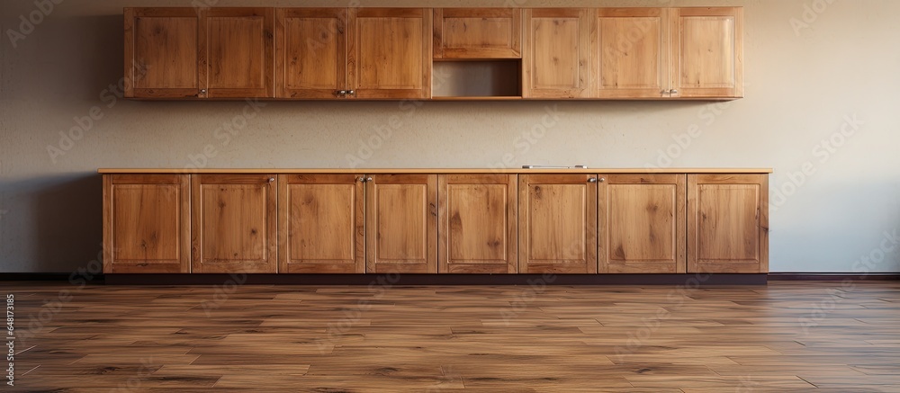 Wooden cabinets and flooring in empty kitchen Wooden cabinets and flooring in empty kitchen