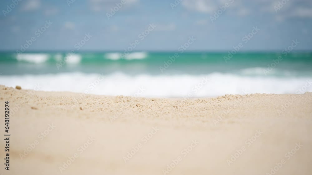 Close up sandy beach blurry selective focus cloudy ocean copy space for product. seashore coast sands seaside island background.
