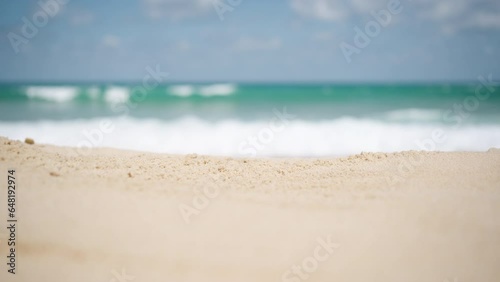 Close up sandy beach blurry selective focus cloudy ocean copy space for product. seashore coast sands seaside island background.