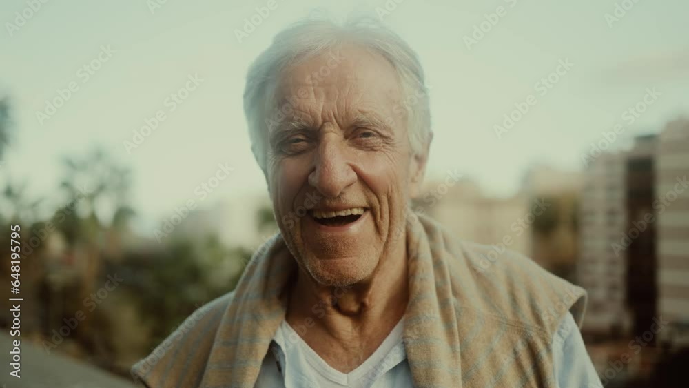 Happy senior man having fun smiling in front of camera outdoor Happy senior man having fun smiling in front of camera outdoor