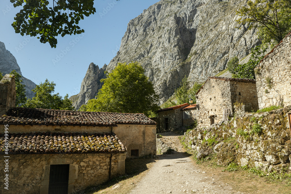 A lovely street road in a small and remote mountainside village. Bulnes is a cobblestone getaway in the mountains only available via hike. Historic and rustic cottages.