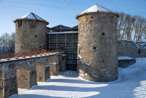 Gate towers of the ancient Koporye fortress on a February day. Leningrad region, Russia photo