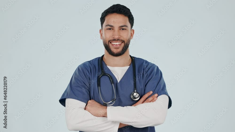 Man, medical nurse and portrait in studio with confidence, pride and arms crossed. Happy indian male, surgeon or healthcare worker on grey background for medicine or friendly specialist service Man, medical nurse and portrait in studio with confidence, pride and arms crossed. Happy indian male, surgeon or healthcare worker on grey background for medicine or friendly specialist service